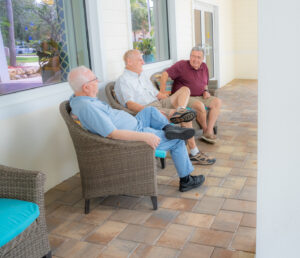 buena vida residents sitting on patio